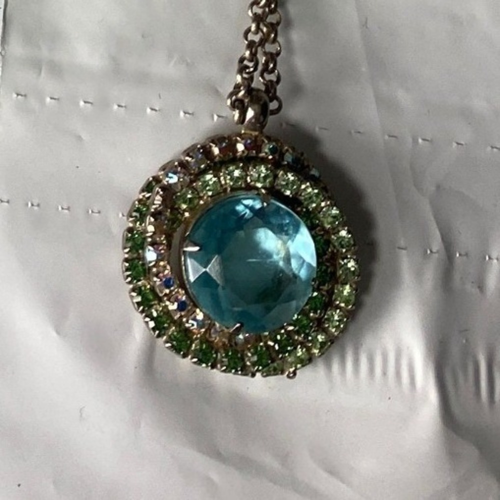 Sparkling Blue Gem Pendant Necklace with Green Crystal Accents Silver Tone Chain